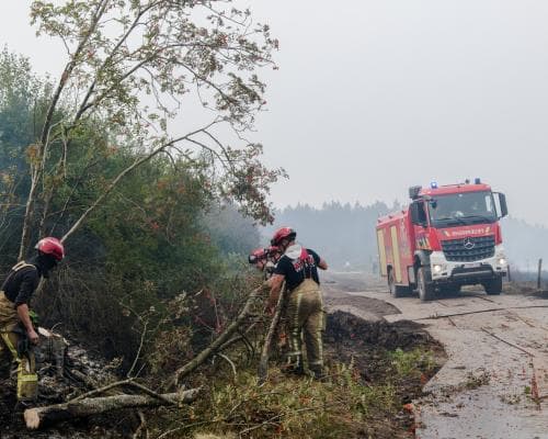 King Philippe of Belgium and the volunteer firefighters of Hautes Fagnes
